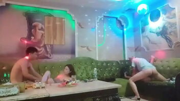 Group fuck-fest in a Chinese KTV bar with a insatiable sitting nymph